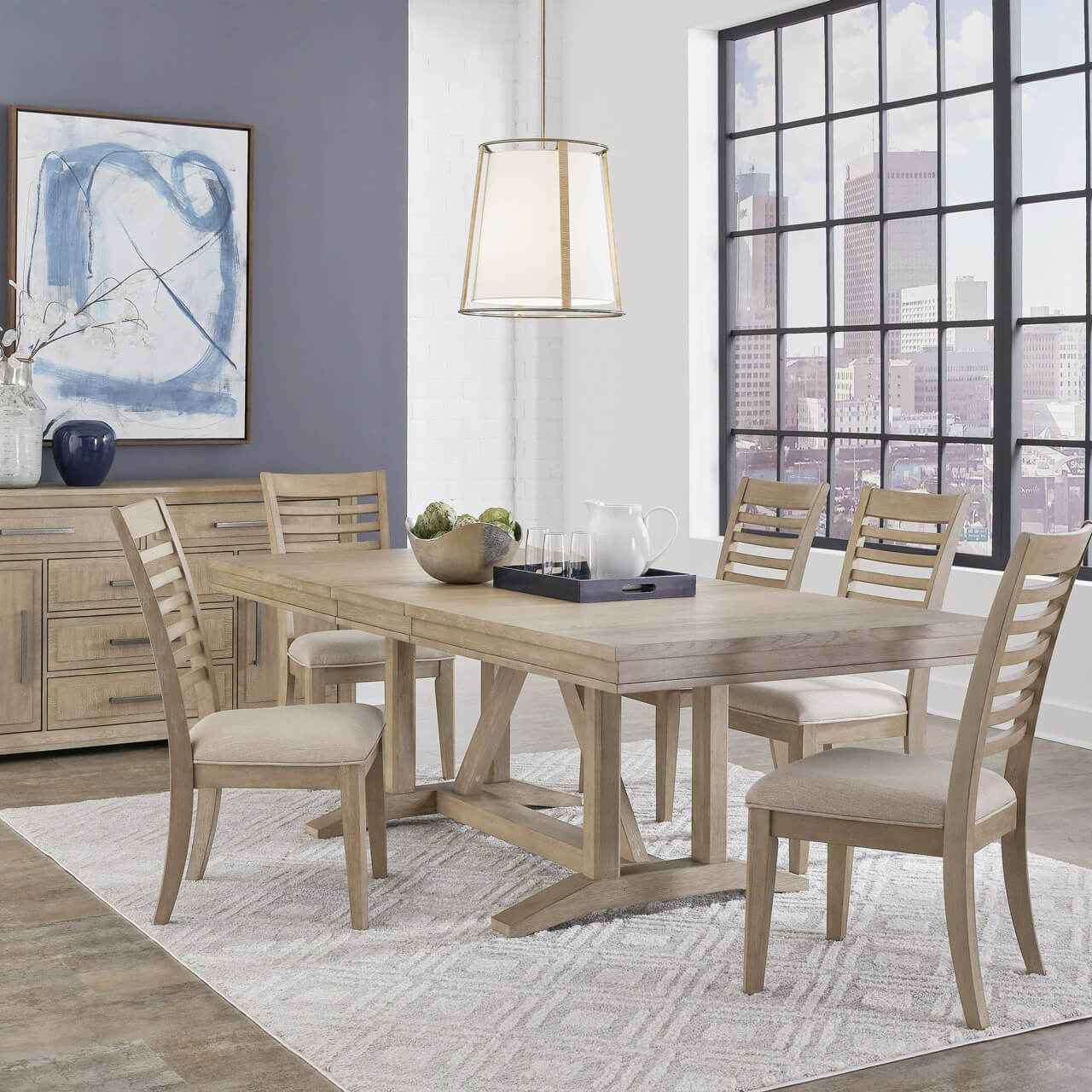 Dining room with light wood table, six chairs, pendant light, and city view through large windows
