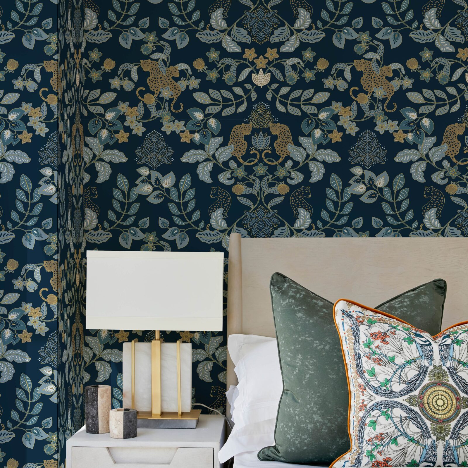 Bedroom with leopard print wallpaper, modern lamp, and patterned pillows