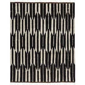 Black and cream area rug