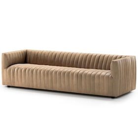 Beige channel-tufted sofa with low arms and backrest