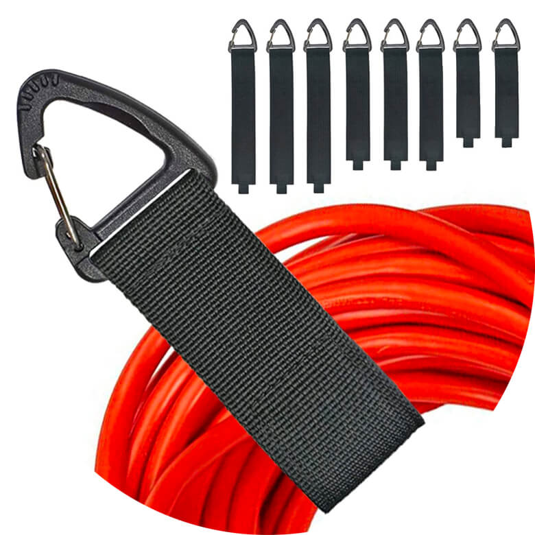 Heavy-duty storage straps with carabiner clip securing red extension cords