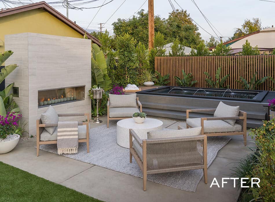 Modern outdoor patio featuring a sleek fireplace, comfortable seating, a small pool, and lush greenery