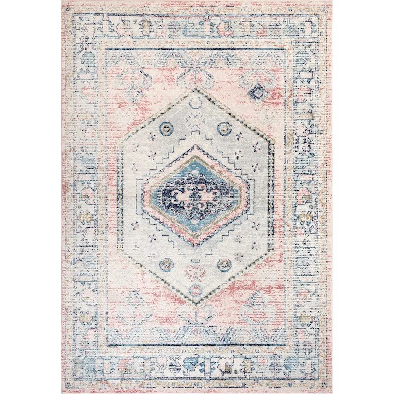 Pastel pink, blue, and white geometric patterned rug with a distressed vintage look