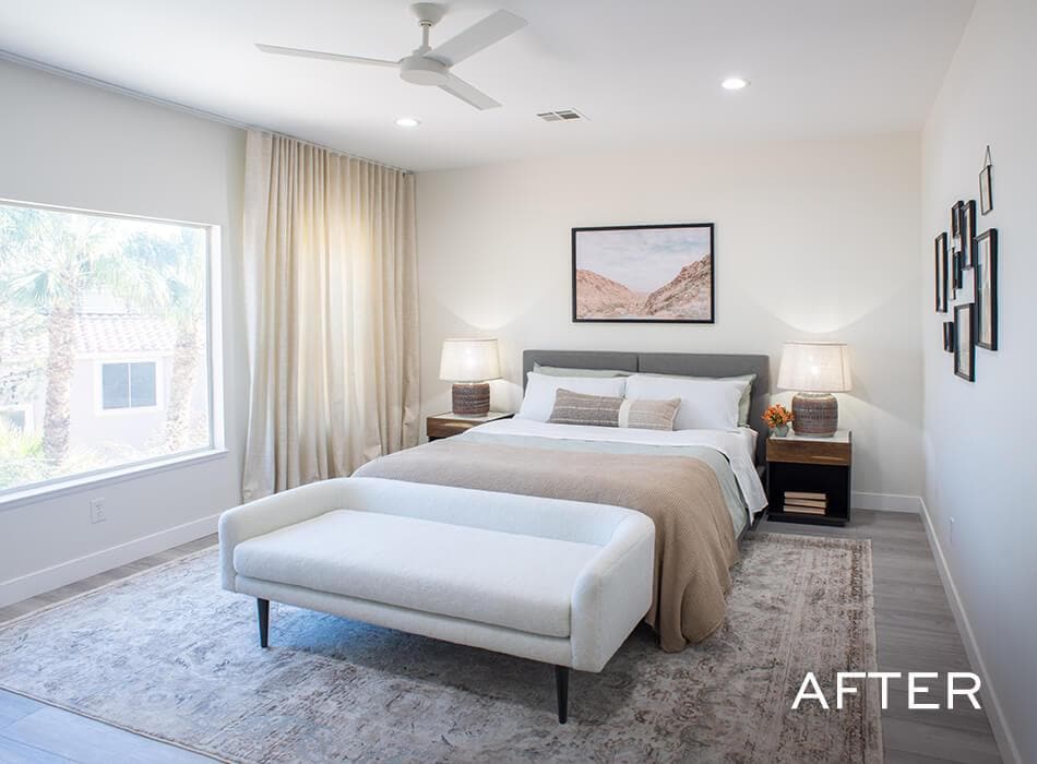 Bright modern bedroom with neutral tones, a large window, and minimal decor