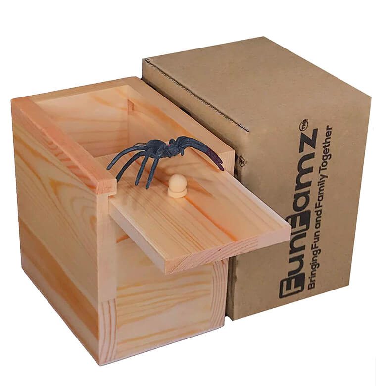 Wooden prank box with a sliding lid that reveals a fake spider inside