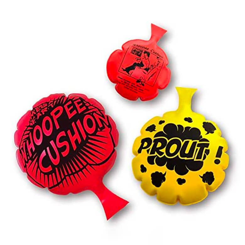 Red and yellow whoopee cushions with playful text designs