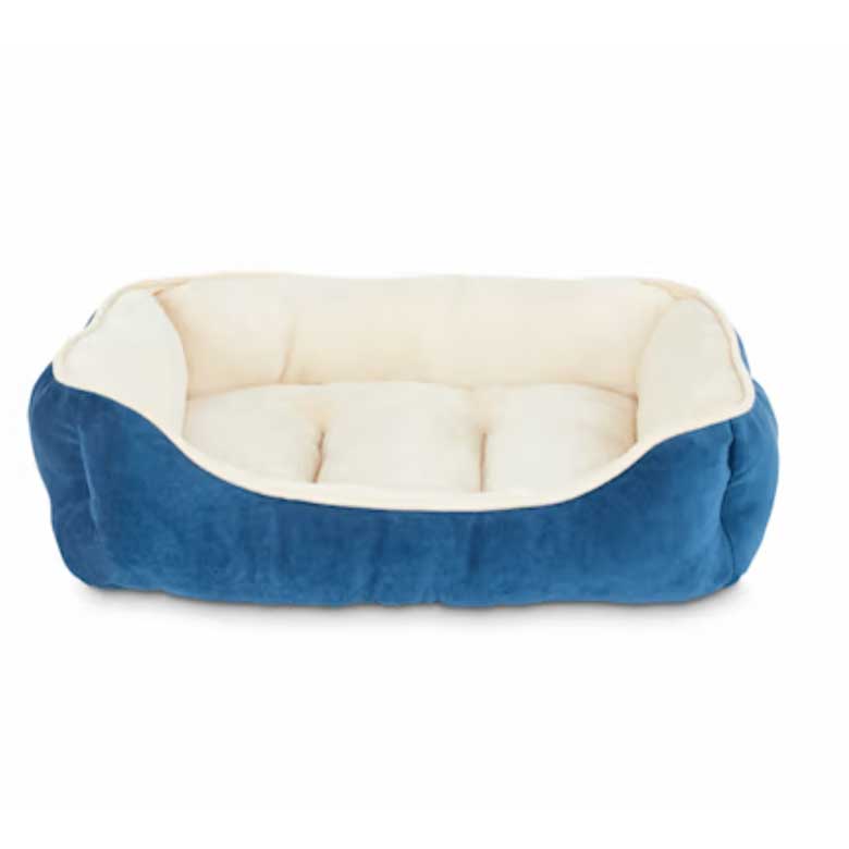 Rectangular blue and cream plush dog bed with cushioned sides and soft interior