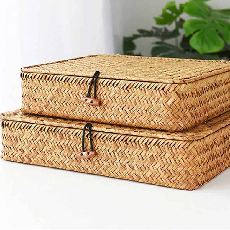 Stacked woven storage baskets with clasp closures