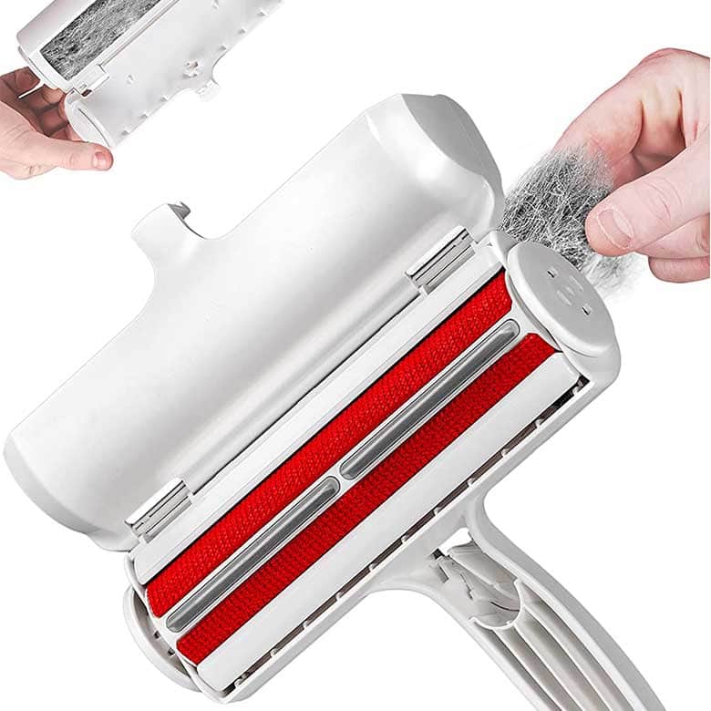 Reusable pet hair remover roller with red fabric brush and compartment for collected fur