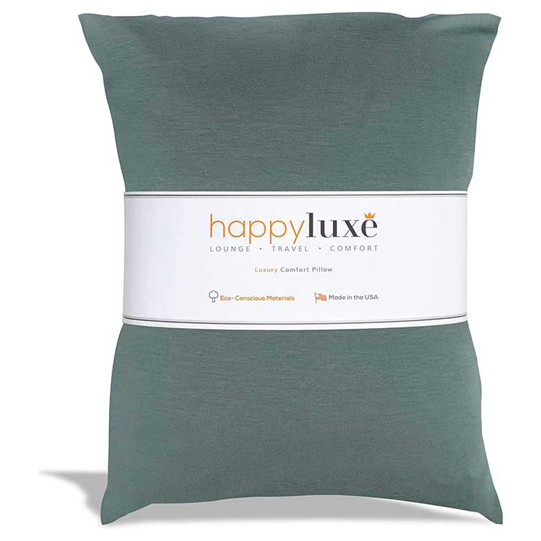 Green Happy Luxe comfort pillow with eco-conscious label and travel-friendly design