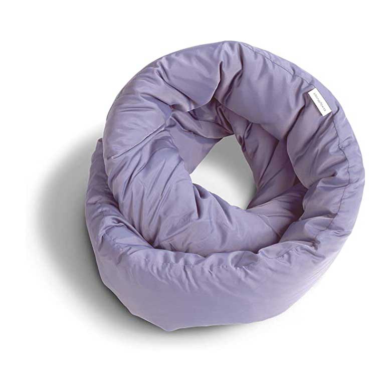 A lavender-colored neck pillow rolled into a spiral shape
