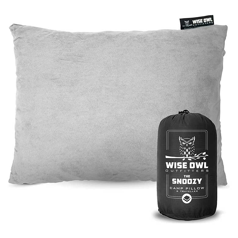 Gray Wise Owl Outfitters camp pillow with black travel bag labeled "The Snoozy"