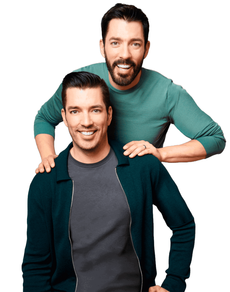 Scott brothers smiling and posing together, one standing behind the other
