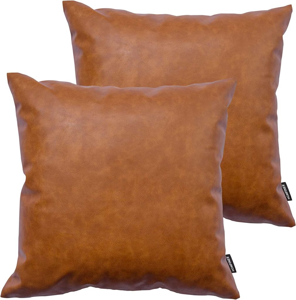 Pair of square brown faux leather throw pillows