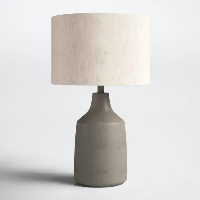 Gray ceramic table lamp with a beige fabric shade