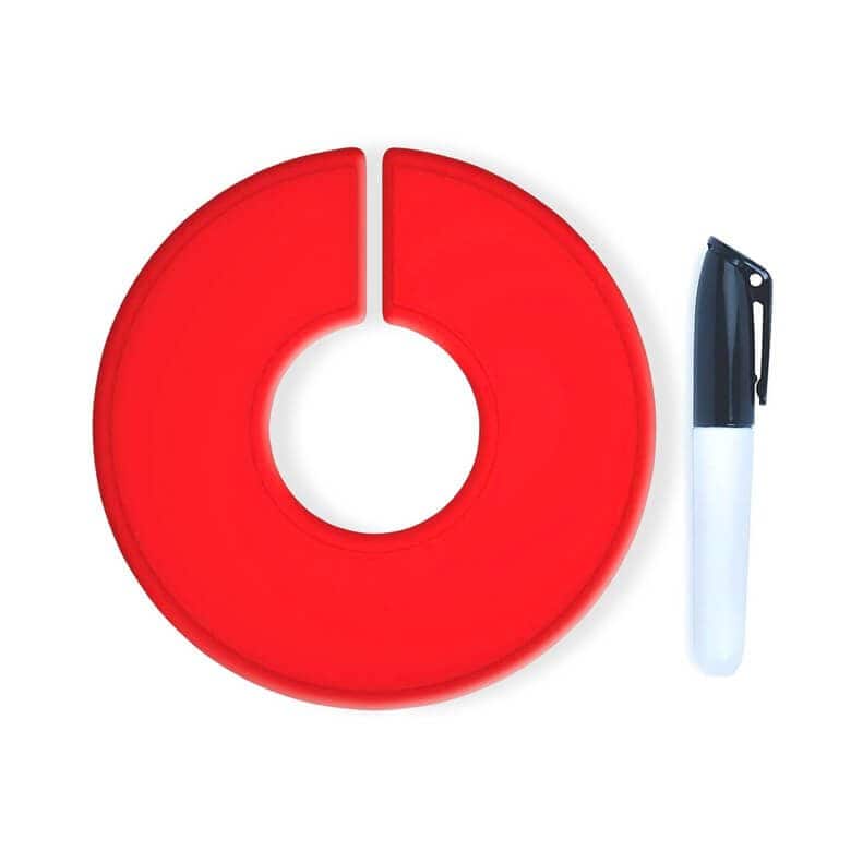 Red circular magnetic marker holder with a slot, shown next to a black and white marker