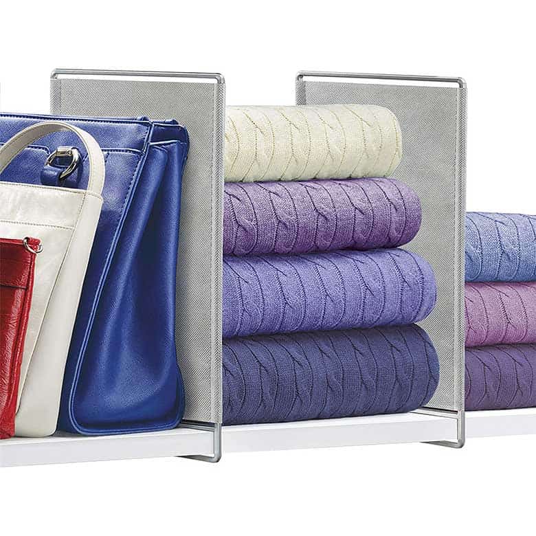 Shelf dividers organizing folded sweaters and handbags