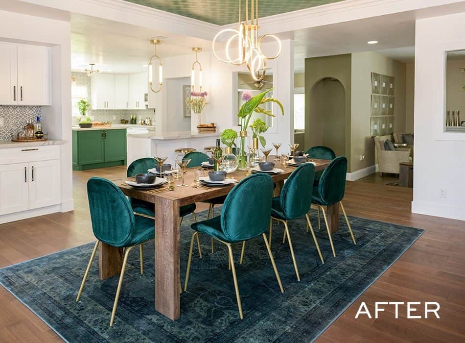 Elegant dining room with a wooden table, green velvet chairs, and a modern chandelier