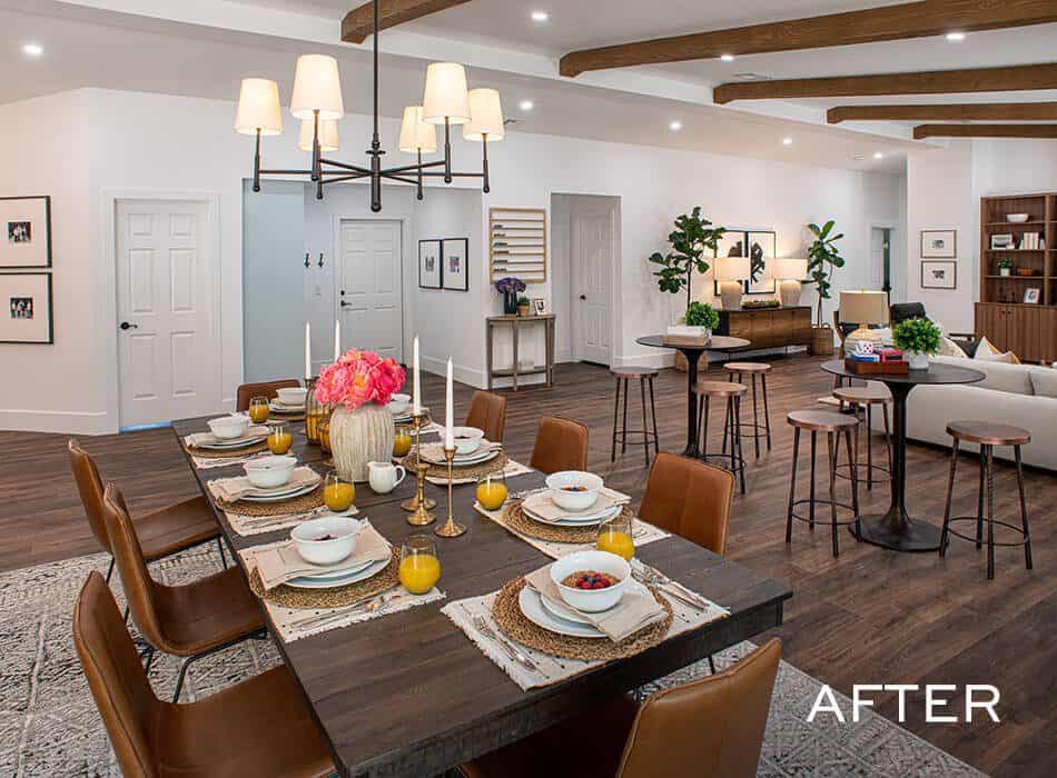 Modern open-concept dining and living space with wooden accents and stylish decor