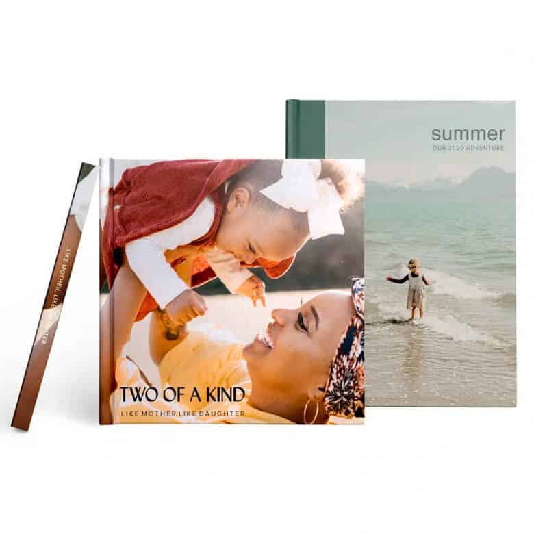 Personalized photo books titled "Two of a Kind" and "Summer Our 2020 Adventure"