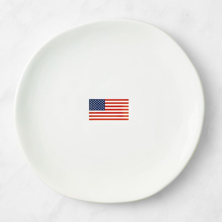 White ceramic plate with a small American flag design in the center