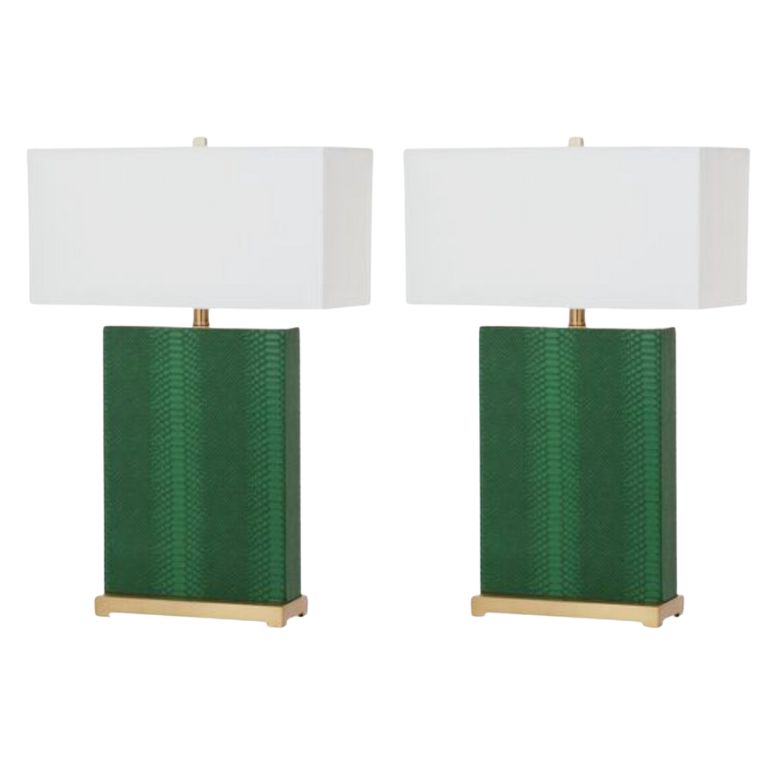Pair of table lamps with green textured bases, gold accents, and white rectangular shades