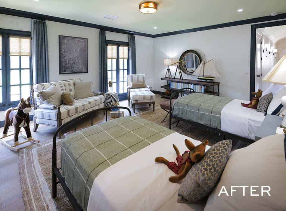 Spacious kids' bedroom with twin beds, cozy seating area, and nautical decor