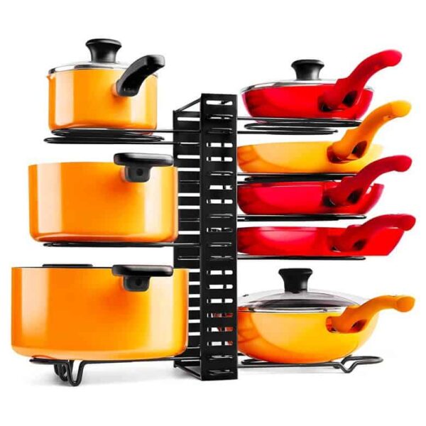 Stackable pot and pan organizer holding orange and red cookware