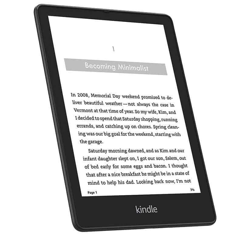 Black Amazon Kindle e-reader displaying a book page titled "Becoming Minimalist"