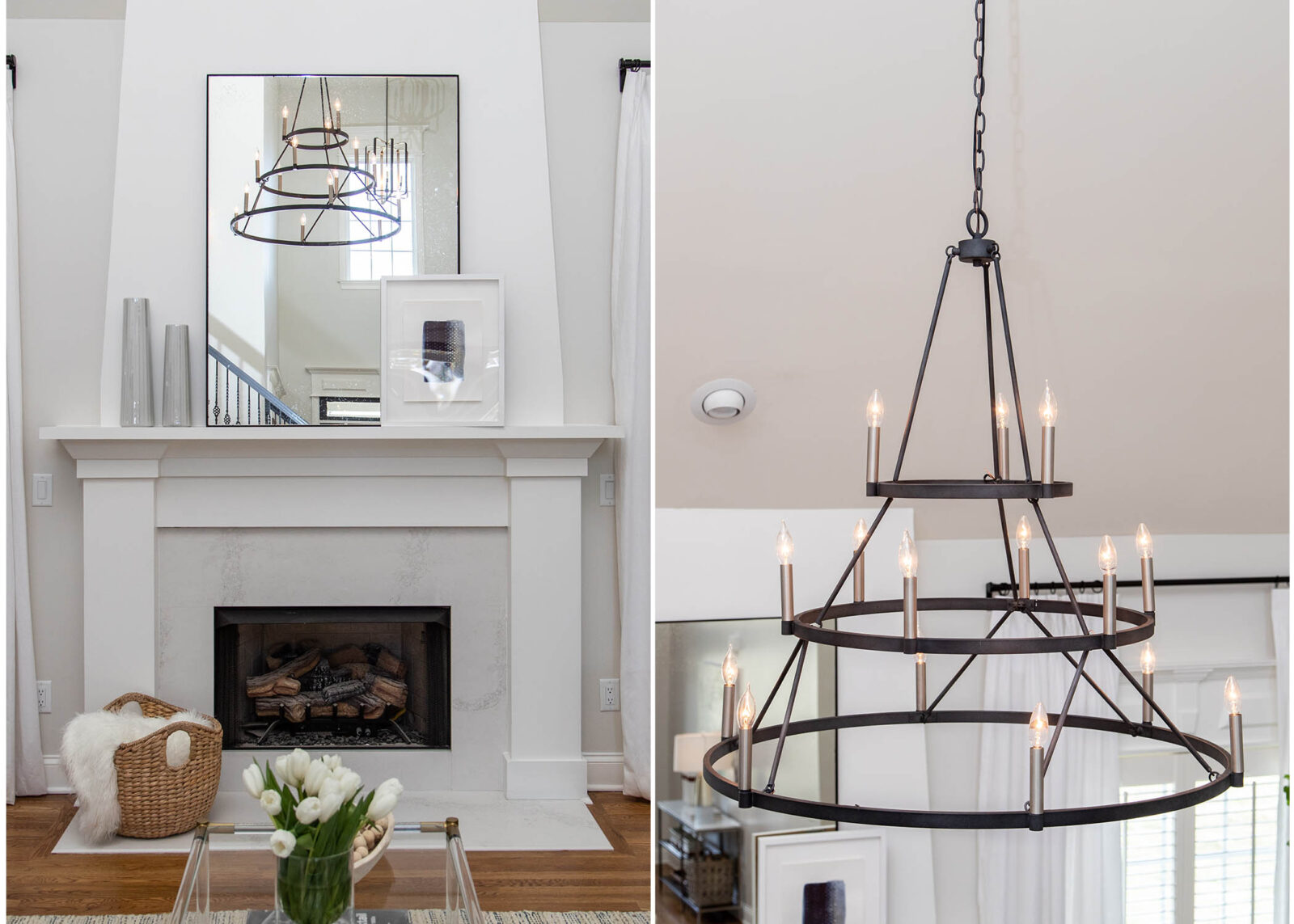 White living room with a modern fireplace and mirror reflecting a black tiered chandelier