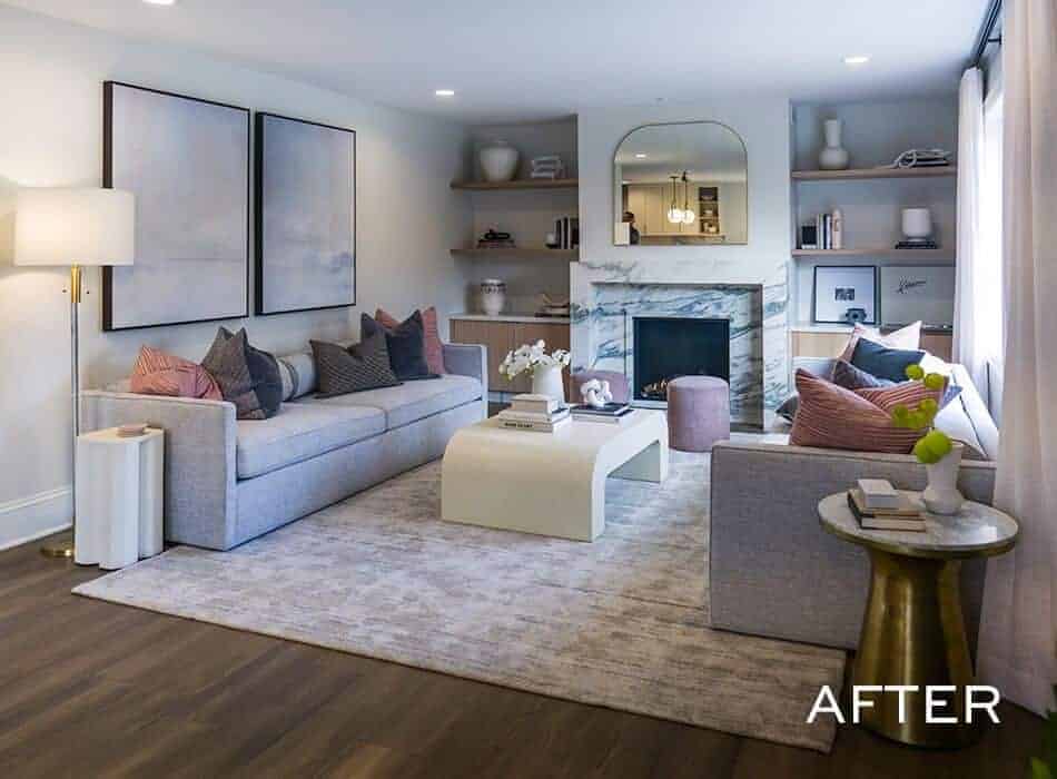 After Image of a living room with a marble fireplace, gray sofas, and a modern coffee table