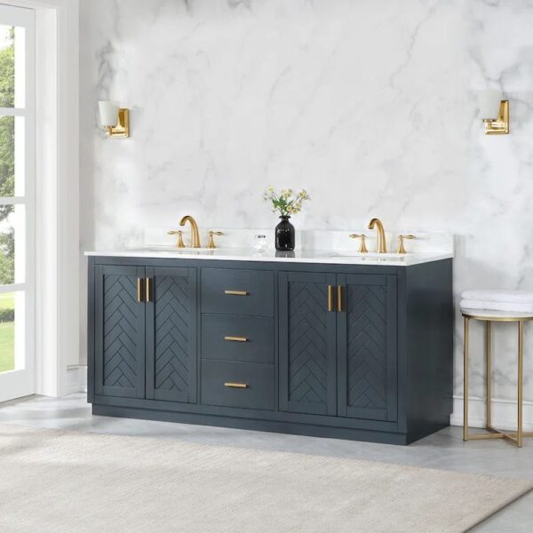 Navy blue double sink bathroom vanity with gold hardware and faucets against a marble wall