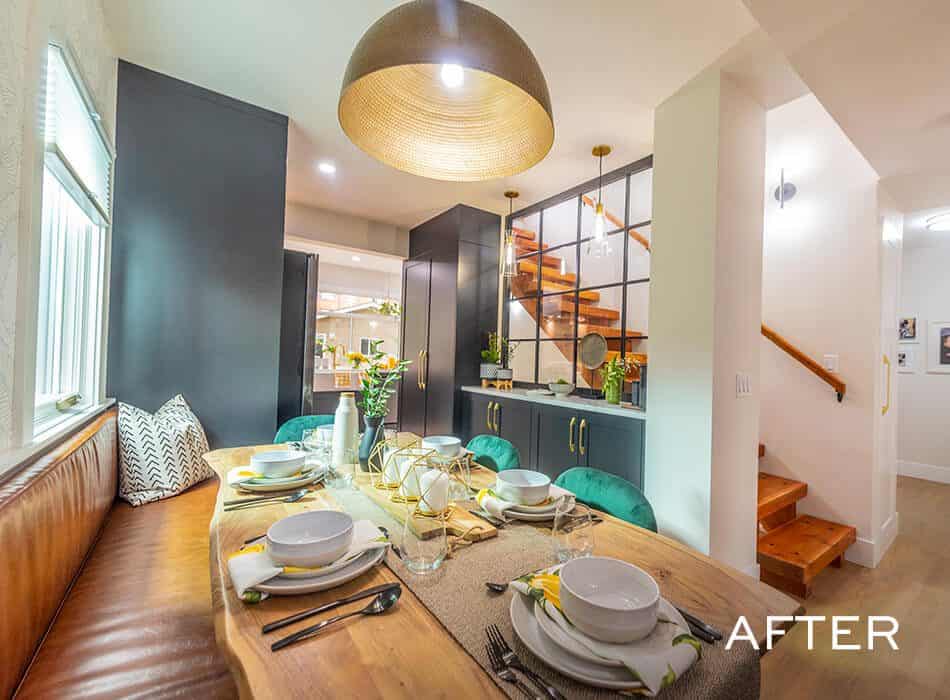 Modern dining area with built-in bench seating, wooden table, green chairs, and gold accents