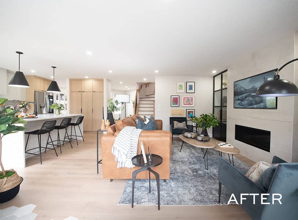 Open-concept living room with modern furnishings and kitchen island