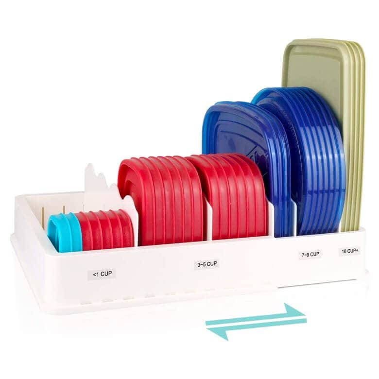 Plastic lid organizer holding various container lids in red, blue, and green