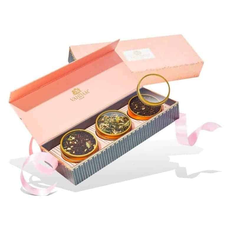 Luxury tea gift set with three loose-leaf tea tins in an elegant pink box
