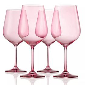 Set of four pink wine glasses with a sleek, modern design