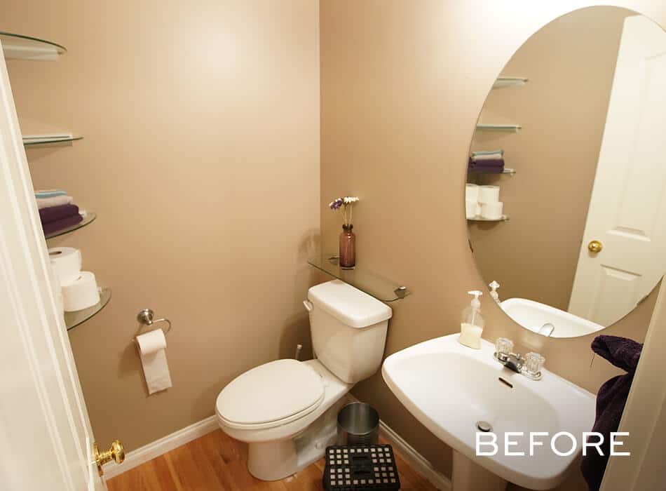 Small bathroom with a beige color scheme, a toilet, pedestal sink, oval mirror, and glass shelves