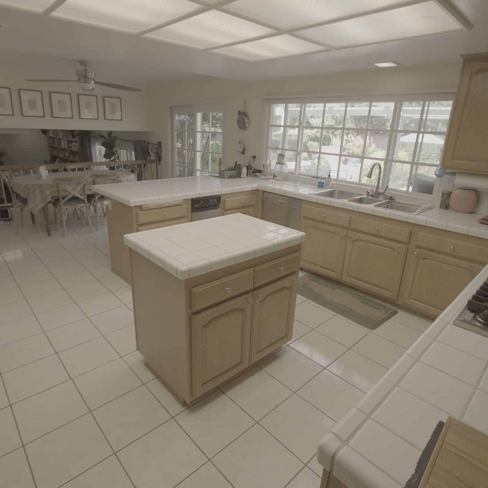 Before image of a traditional kitchen with slightly dated aesthetic