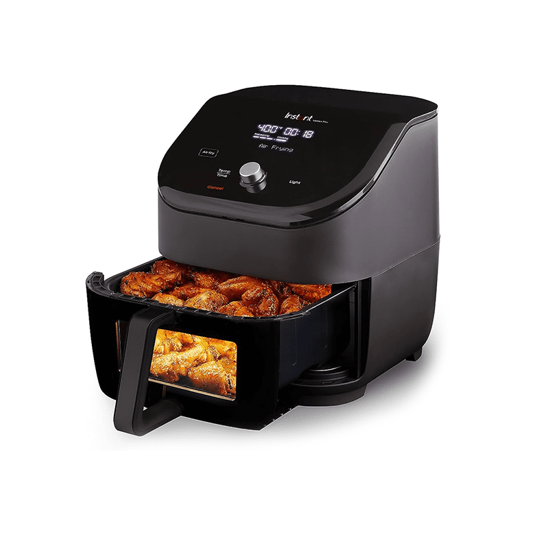 Air fryer with chicken wings and digital controls
