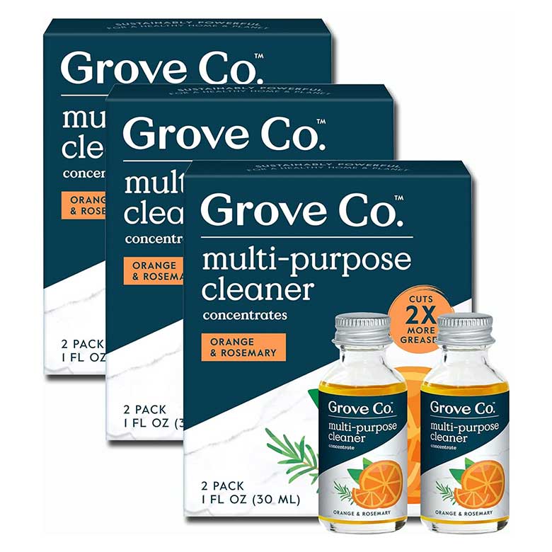 Grove Co. multi-purpose cleaner concentrates in orange and rosemary scent, shown in boxes with small bottles
