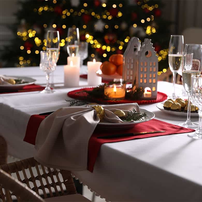 holiday table with lighting and place settings