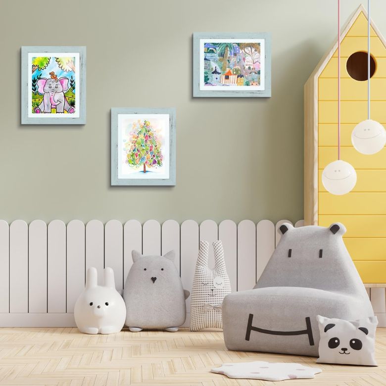Playroom with framed art, plush animal chairs, and soft toys