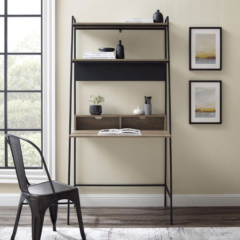 Minimalist ladder desk with wood shelves, decor accents, and a metal chair.