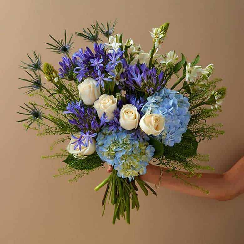 the bouqs aquamarine hydrangeas and roses