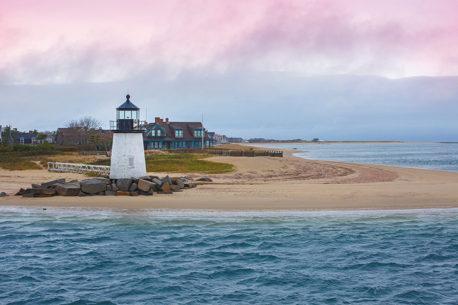 nantucket beach cape at dusk with a beautiful pink sky
