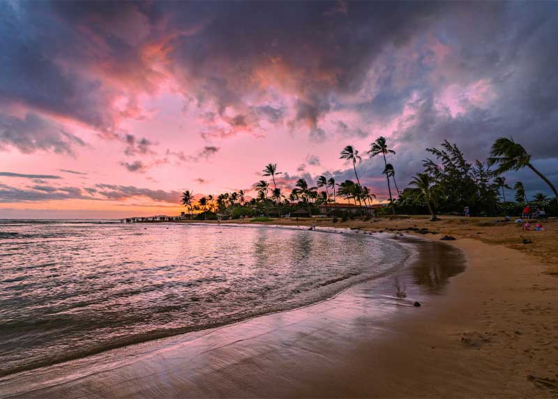 poipu beach, koloa, hawaii at sunset