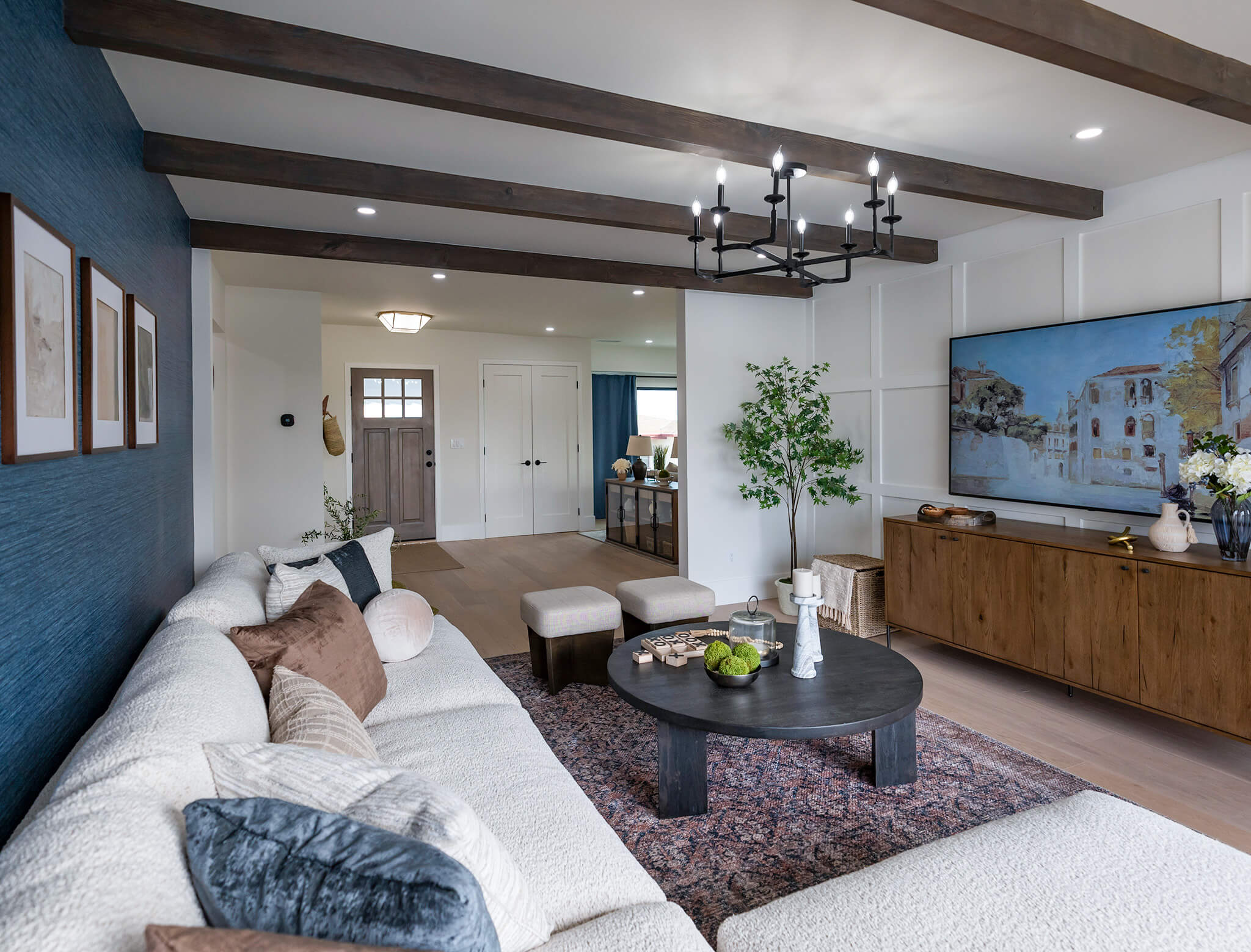 modern living room with dark wood beams