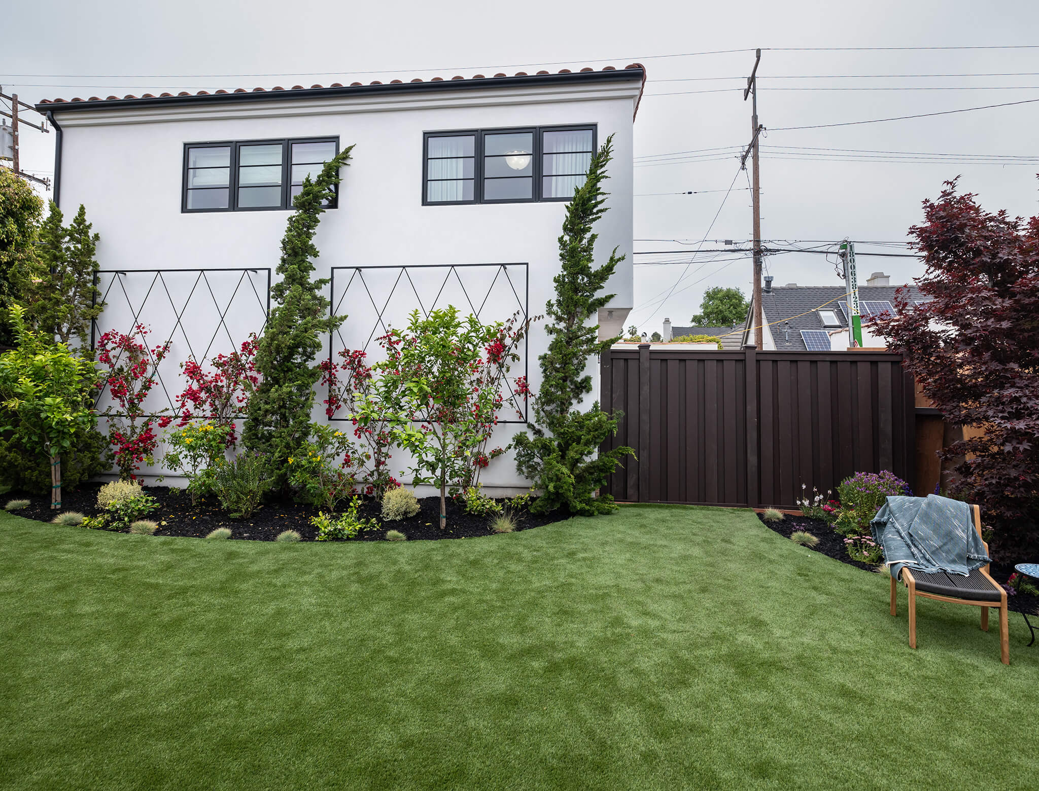 don't hate your house mom and dad beautiful backyard full of flowers and grass