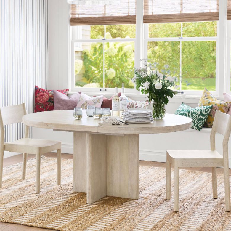 white wooden round dining table